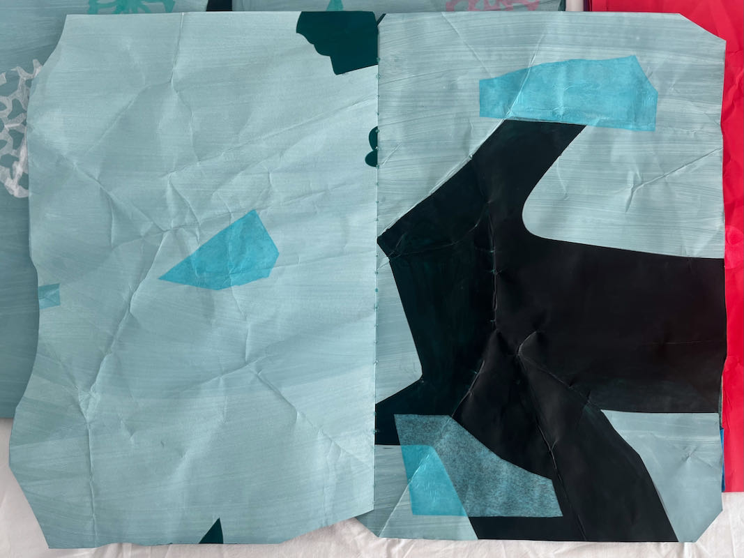 A spread from the work Ice Notebook / Aukeama teoksesta Jäävihko, 2019/2024, college, height approx. 60 cm